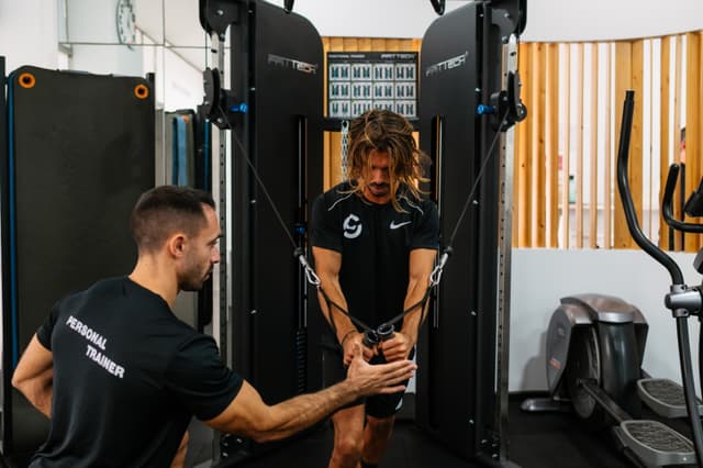 Fabio training cable crossover hold